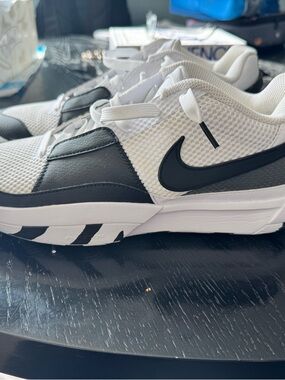 Nike Men’s White and Black Low-Top Sneakers with Swoosh